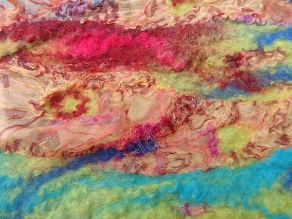 silk and wool - nuno scarf 
 silk and wool combined i.e nuno scarf 
 Keywords: silk and wool, nuno, nuno scarf, feltmaking, fibre art, merino wool, silk scarf,